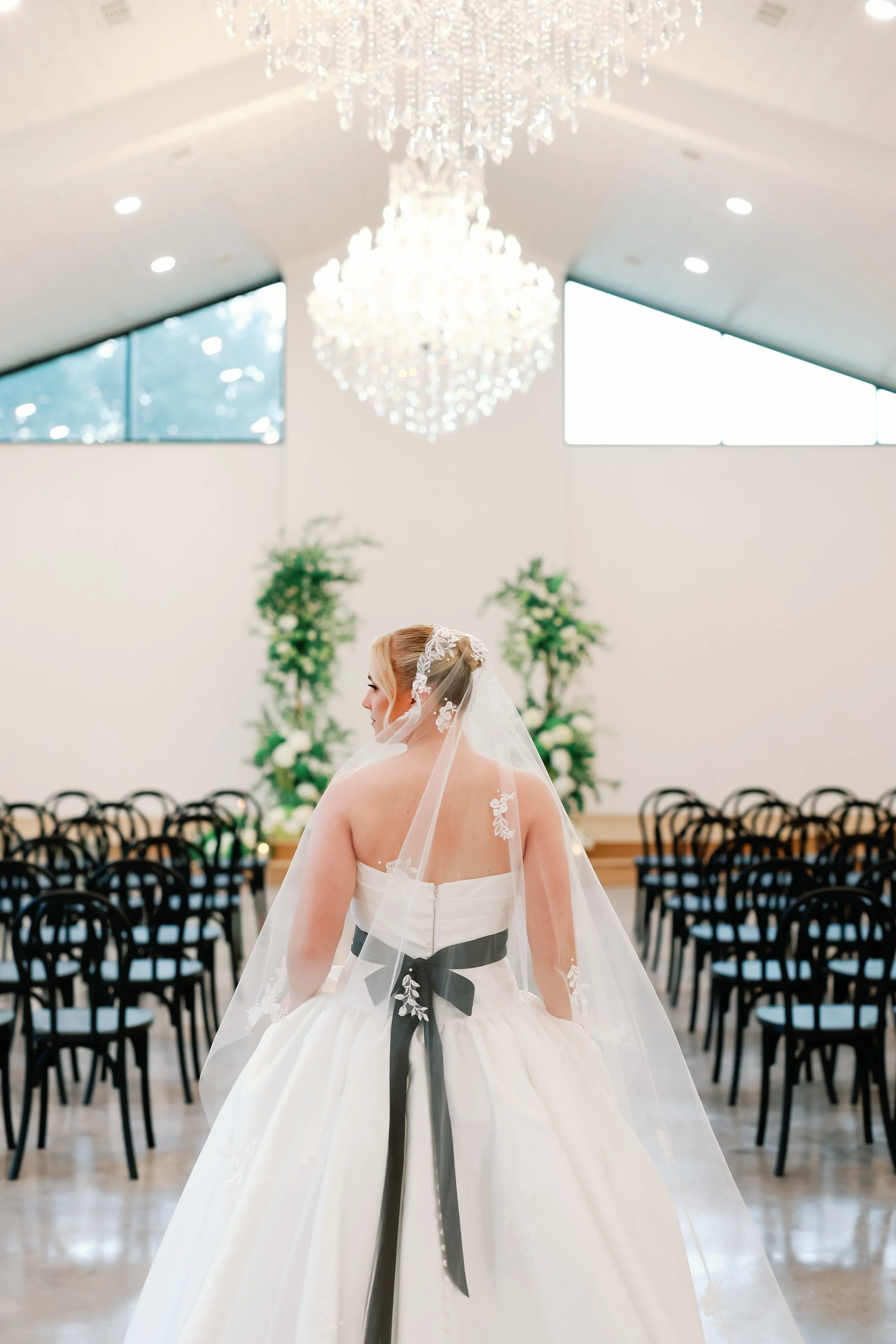 Bride wearing a dress from Sloane Bridal
