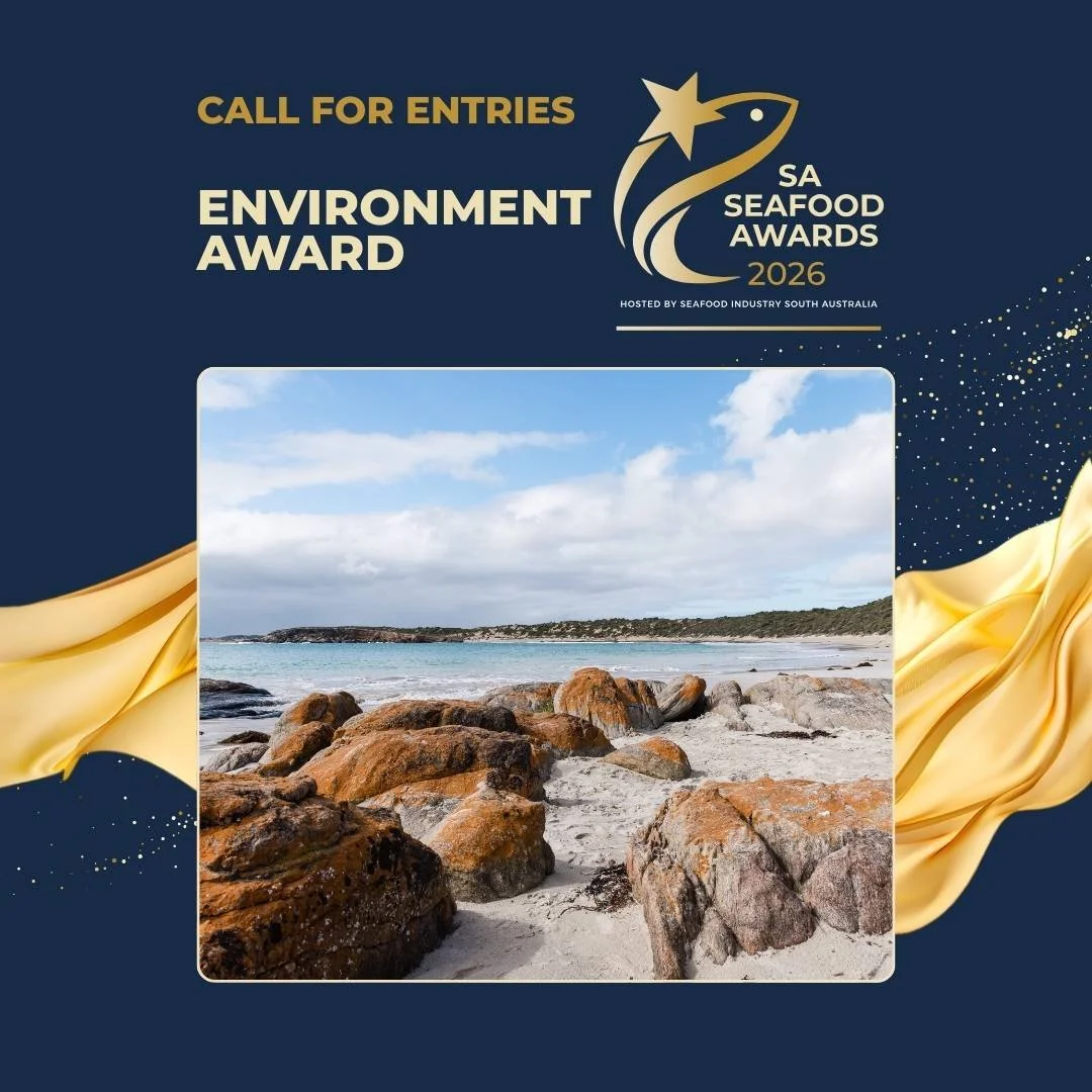 Beach with rocks, sand, water, and sky, promoting the SA Seafood Awards 2026, hosted by the seafood industry South Australia, with a navy blue background and gold decorative elements.