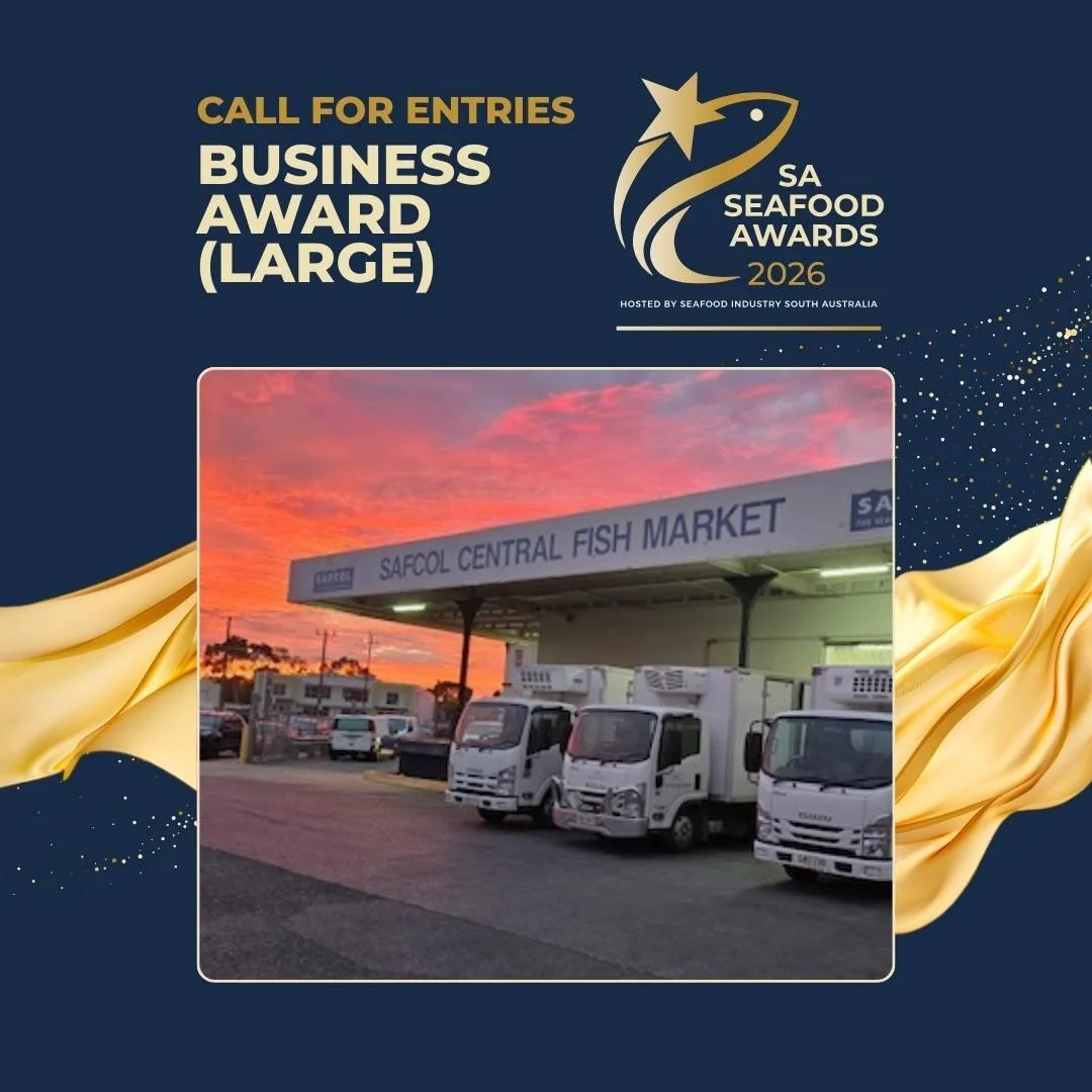 Line of refrigerated trucks parked outside Safcol Central Fish Market during sunset at the SA Seafood Awards 2026.