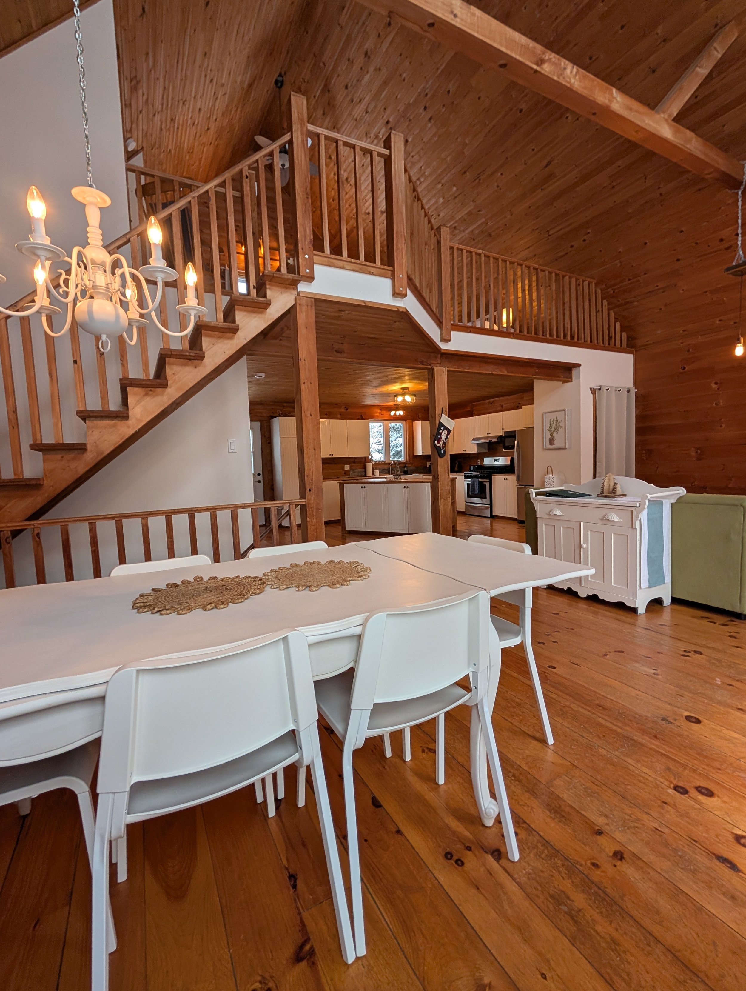 Dinning area with view of the kitchen and Cedar loft