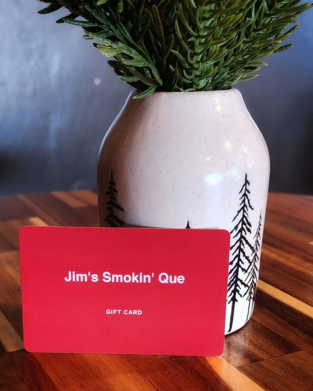 Holiday gift stress? Solved.

Jim's Smokin' Que offers BBQ lovers versatile gift card options, available as physical cards in-store or electronic ones online. These cards are more than just a gift; they're invitations to savor exceptional BBQ flavors
