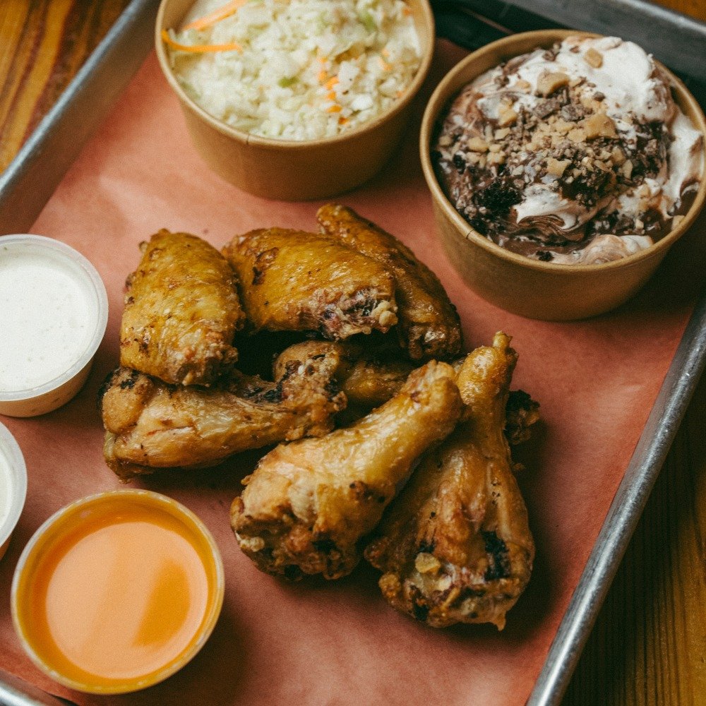 Go ahead, order some of our Smoked Wings... the weekend is right around the corner!!! 

Your taste buds and belly will say, "thank you"!

Don't  forget the Banana Pudding and the Creamy Coleslaw!!! Oh Yeah!!!