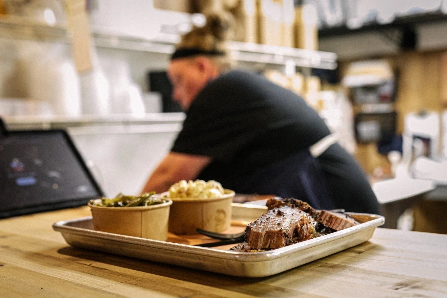 Collard Greens + slow-smoked brisket = a combo that'll haunt your dreams.