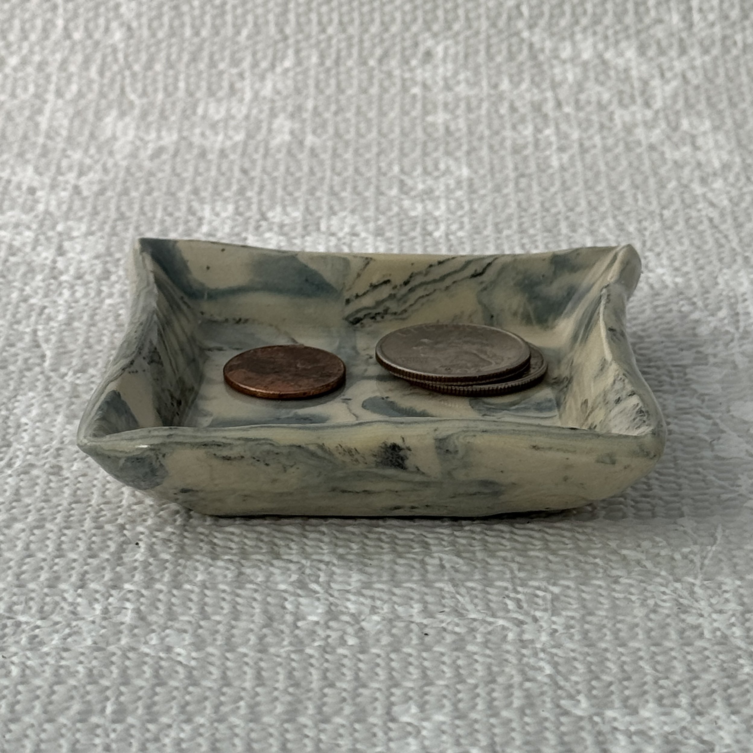 trinket-plate_blue-marble_with-coins.jpg