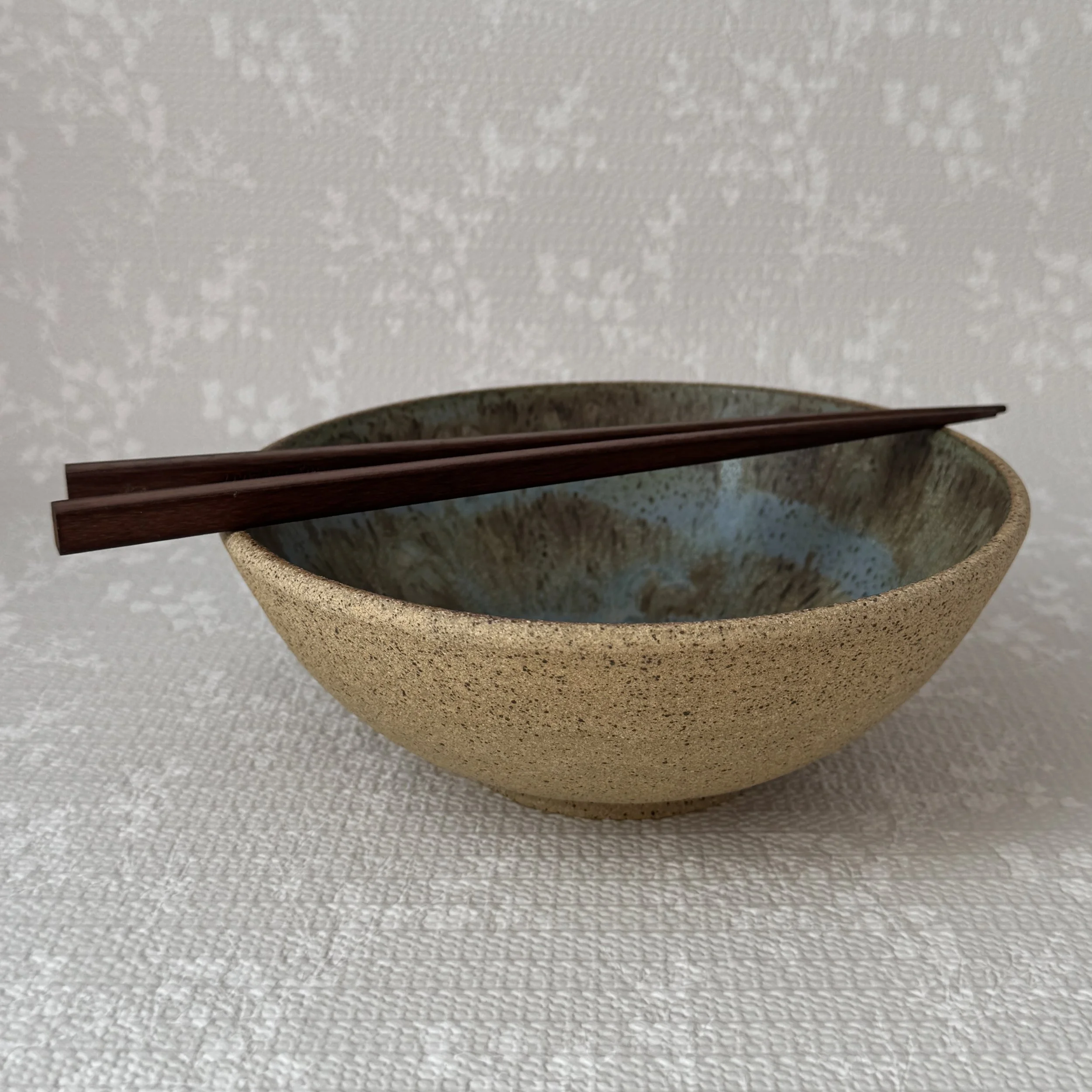 everyday-bowl_blue-brown-swirls_with-chopsticks.jpg