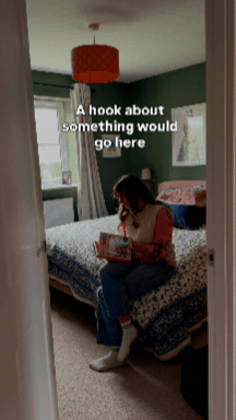 A woman sitting on a bed in a bedroom, reading a book, with text overlay that says 'A hook about something would go here.'