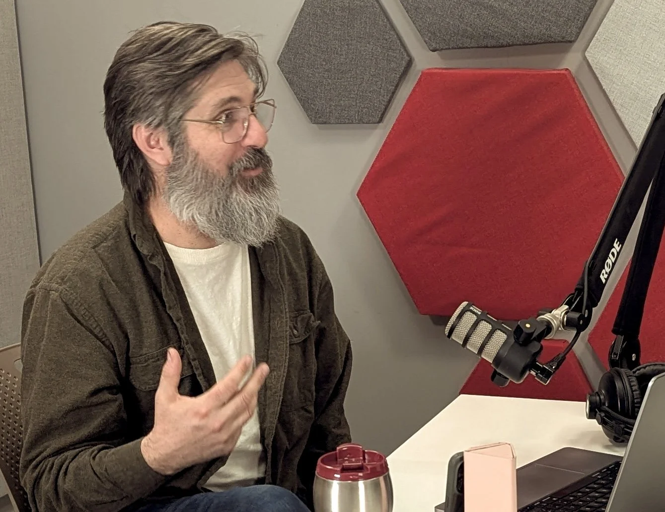 Prima Vista AI CTO Russ Fischer recording with a boom microphone