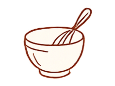 A matcha bowl with a bamboo whisk.