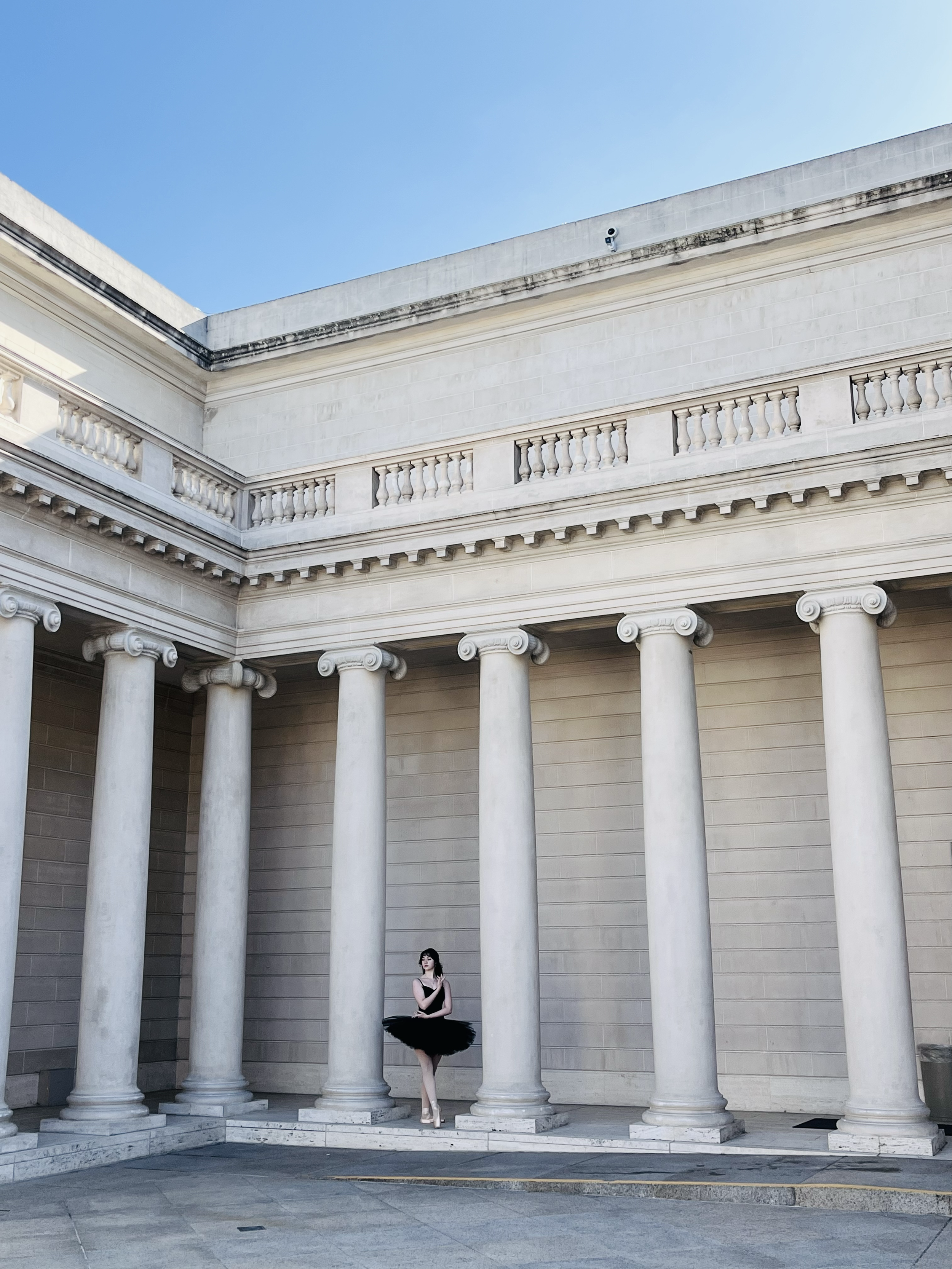 Ballerina with architectural backdrop.png