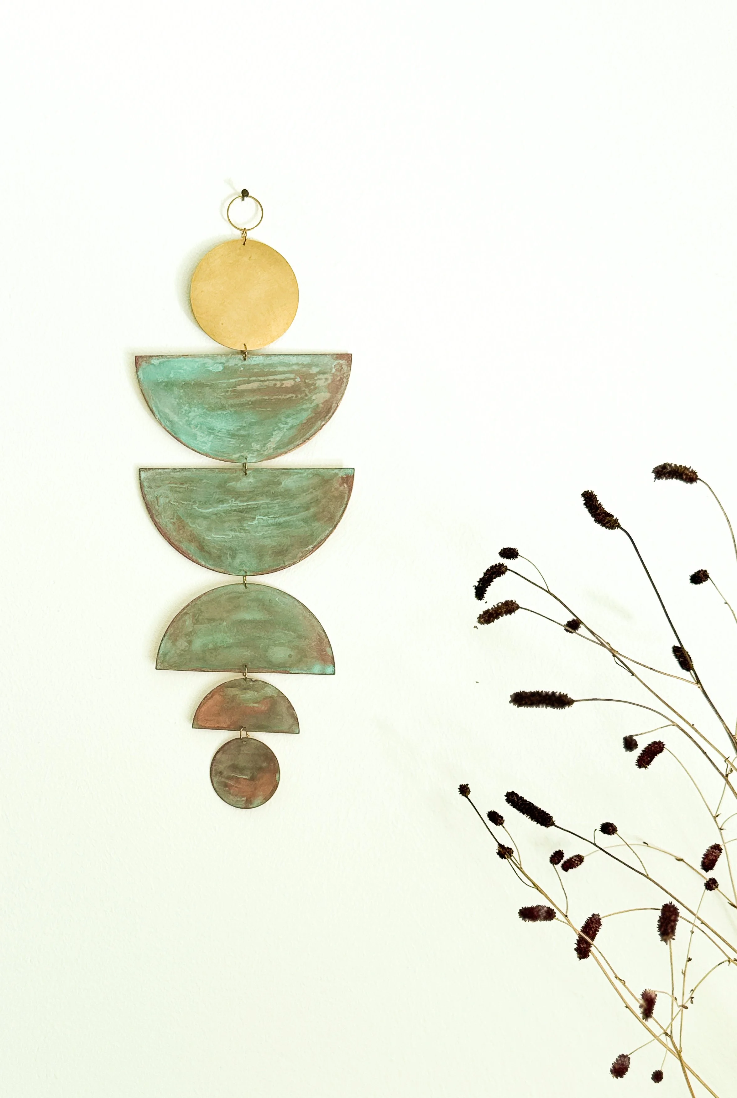 ONA – Brass Wall Hanging with Verdigris Patina