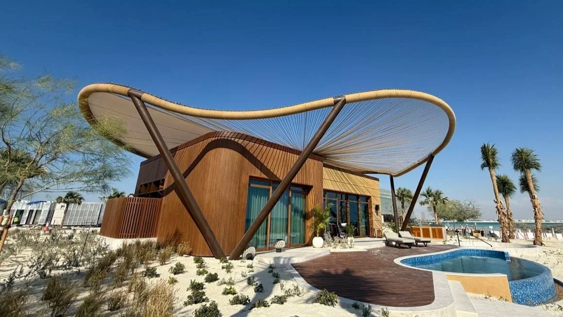 Noble Architecture External  -  Building Envelope  -  Teakwood Cladding  with Bespoke Wooden Slider Door