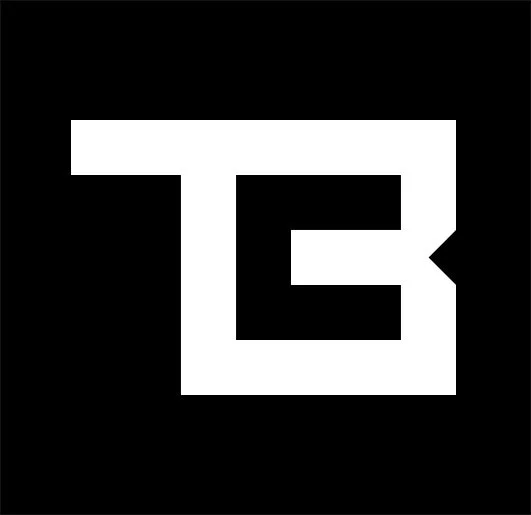 TOM BUDD