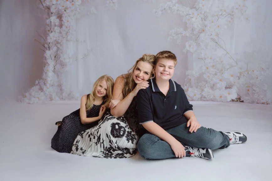 Mommy and Me photoshoot in Mercer County NJ studio with soft white floral background