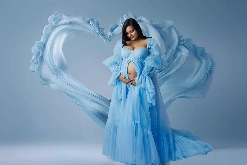 Maternity photography session featuring an expecting mother with her daughter in a styled studio setup in South Brunswick, NJ
