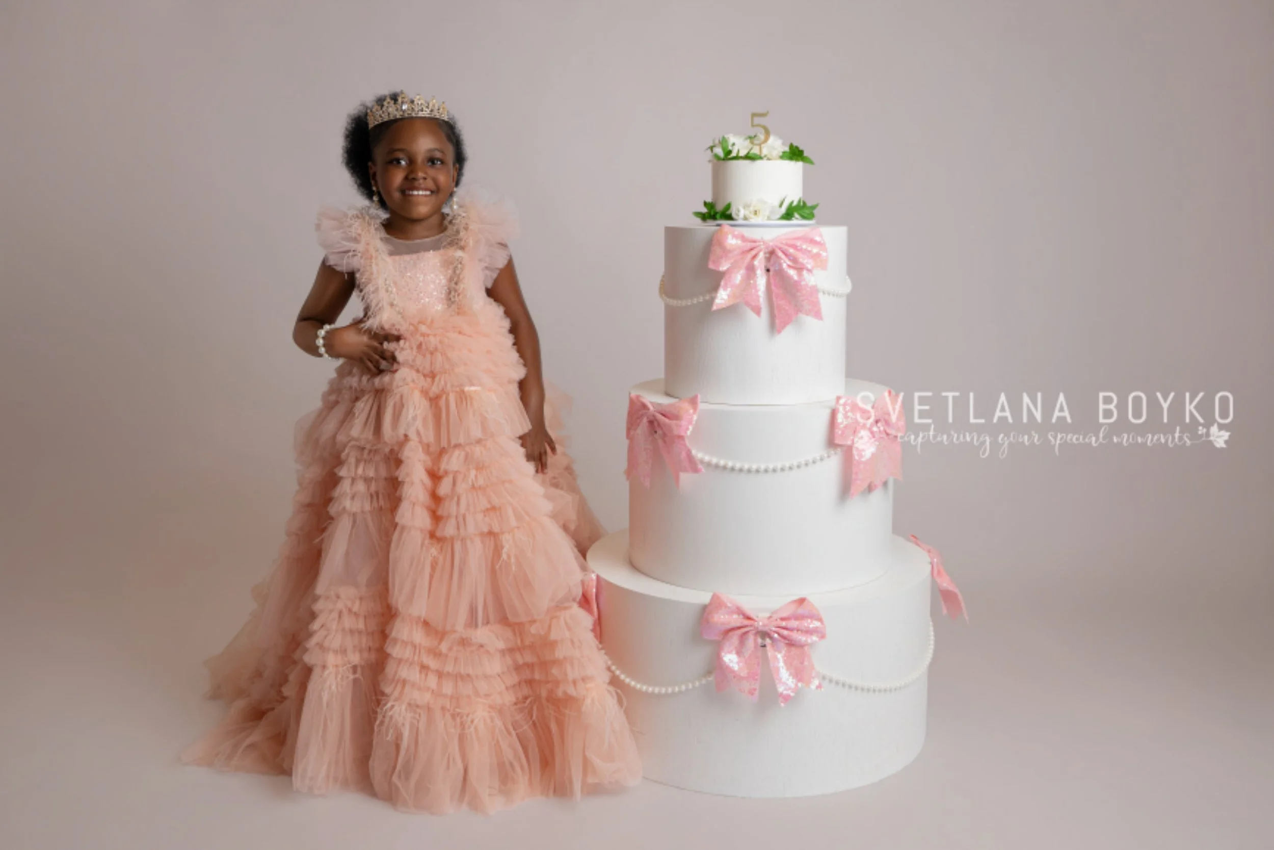Luxury 5th birthday photoshoot with giant cake prop and princess dress in Mercer County NJ studio