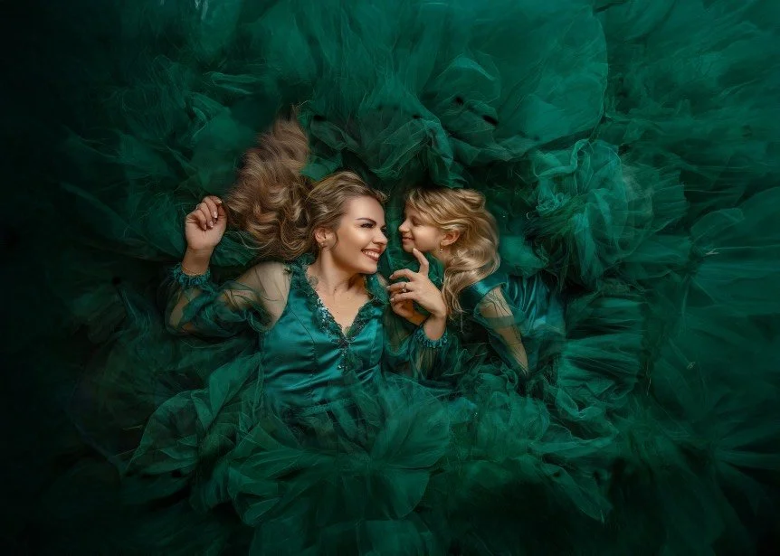 Elegant mother and daughter fine art portrait in flowing green gowns, luxury Mommy and Me session in Central NJ photography studio