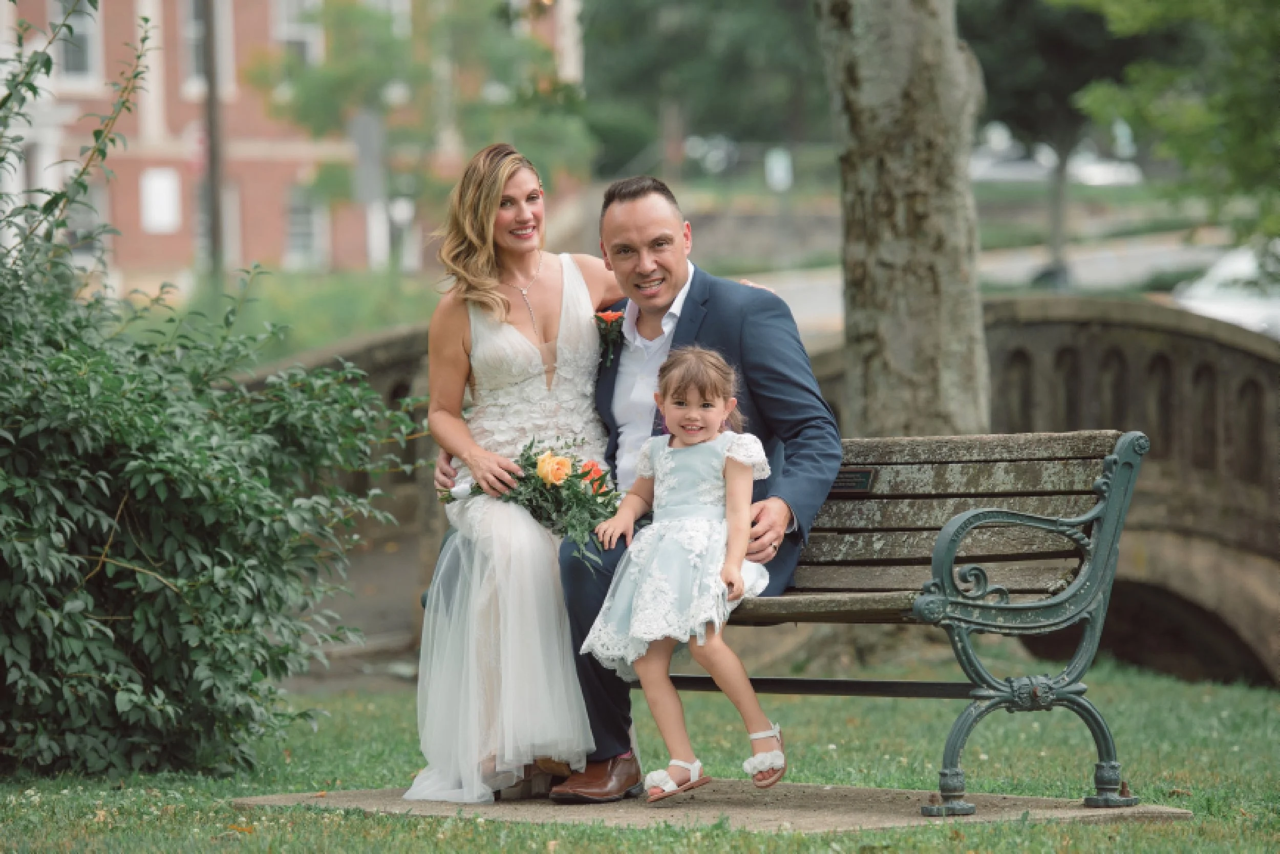 Parents and their child during an outdoor portrait session