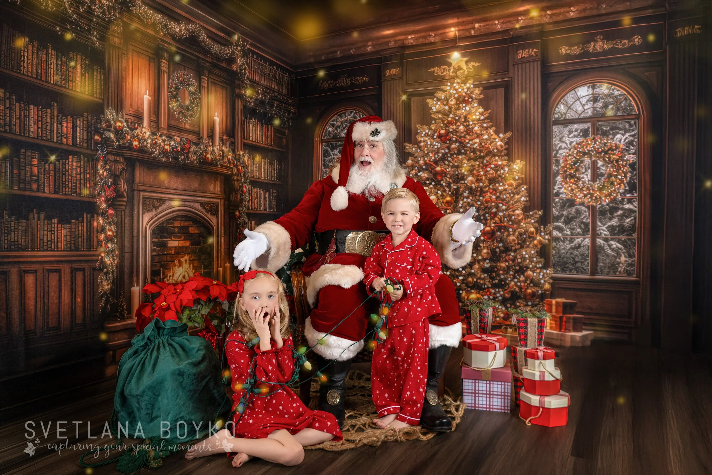 Child and Santa sharing a natural, joyful moment during the Santa Experience