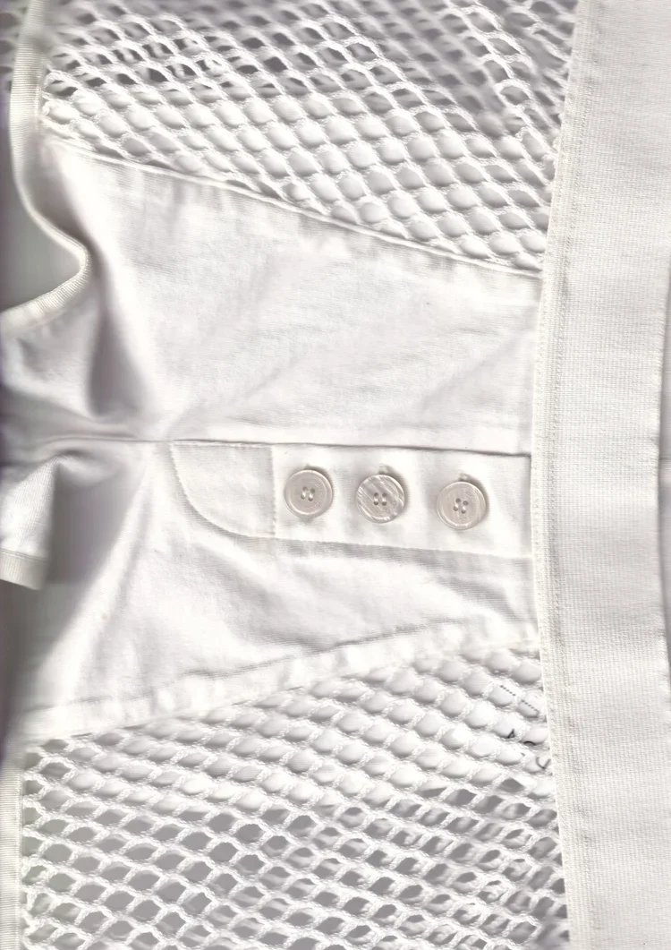 
John Galliano Mesh Construction | 18.01LONDON

John Galliano mesh garment featuring transparent technical construction within the 18.01LONDON archive.

Experimental transparency and innovative textile development.
