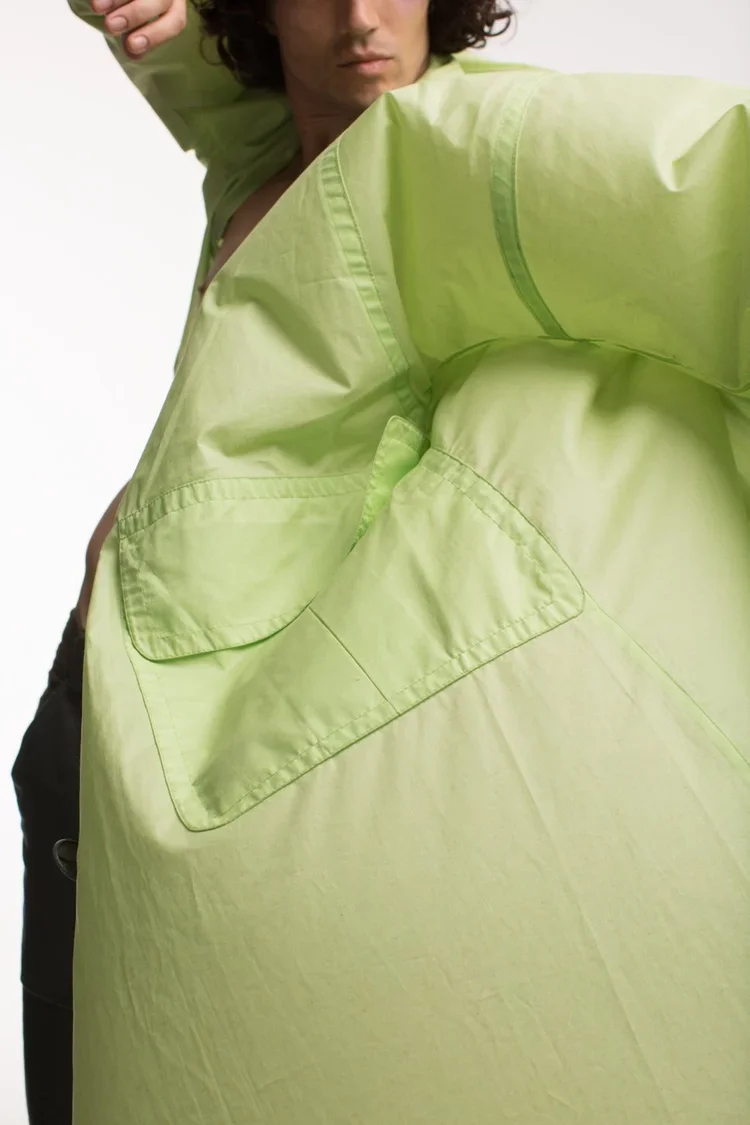 SEO Title
Acid Green Technical Nylon Windcoat | 18.01LONDON Fashion Archive
Alt Text
Oversized acid green technical nylon windcoat featuring exaggerated pockets and utilitarian construction.
Meta Description
Technical nylon outerwear exploring oversi