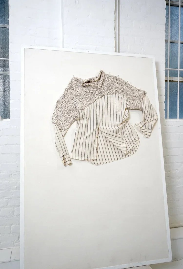 
Hybrid Knit & Shirt Construction | 18.01LONDON Archive

Experimental garment combining heavyweight knitwear with striped cotton shirting panels.
Meta Description
Innovative hybrid garment combining knitwear and shirting construction to explore mater