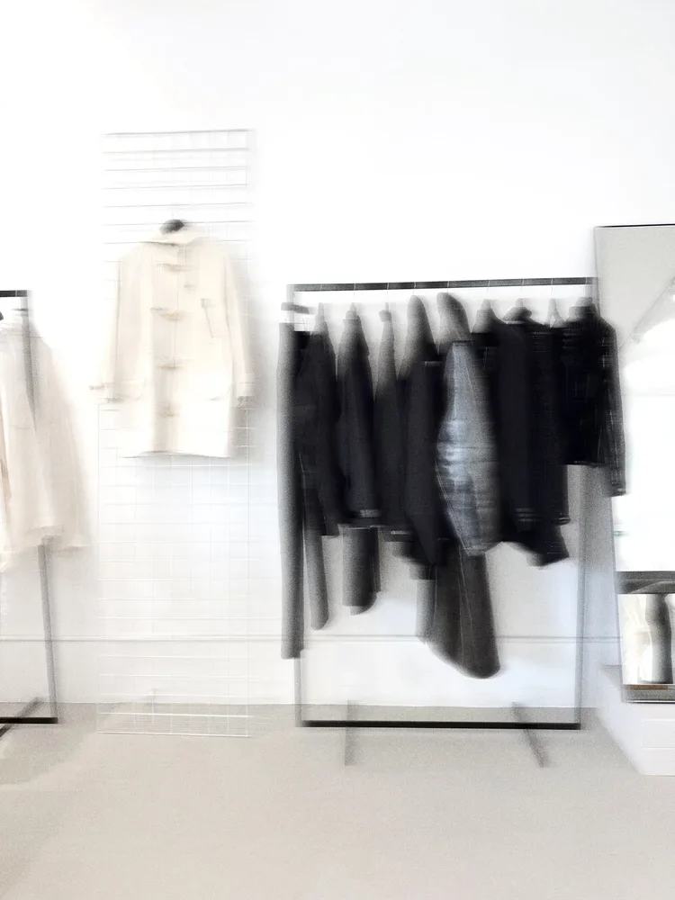 Editorial Archive Interior
Atmospheric motion-blurred view of the 18.01LONDON archive interior with curated garment displays.
Editorial photography capturing the atmosphere of London's leading luxury fashion archive and research destination.
| 18.01L