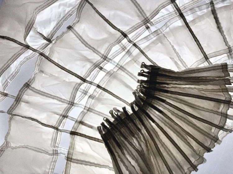 
Parachute Panel Skirt | 18.01LONDON

Vintage pleated skirt featuring stitched panel construction preserved in the 18.01LONDON archive.

Technical pleating and engineered movement.
