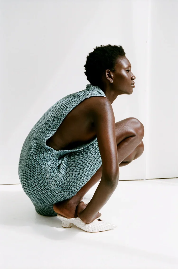 Balenciaga Nichola Ghesquire Open-Weave Knit Structure dress
Hand-knitted open-weave garment exploring oversized gauge, transparency and sculptural knit construction through an exaggerated silhouette.
An exploration of negative space and texture, dem