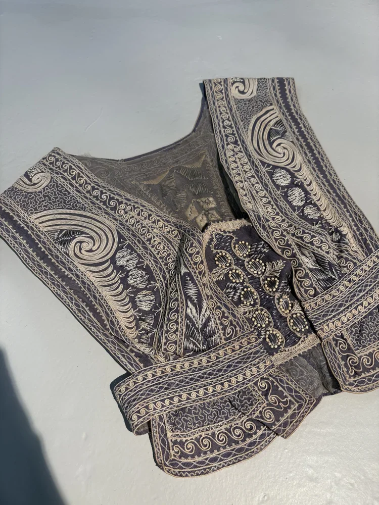 Antique Embroidered Tabard | Historic Fashion Archive | 18.01LONDON

Historic embroidered tabard featuring intricate metallic embroidery and hand-finished textile decoration.

An exceptional antique embroidered tabard demonstrating historic textile c