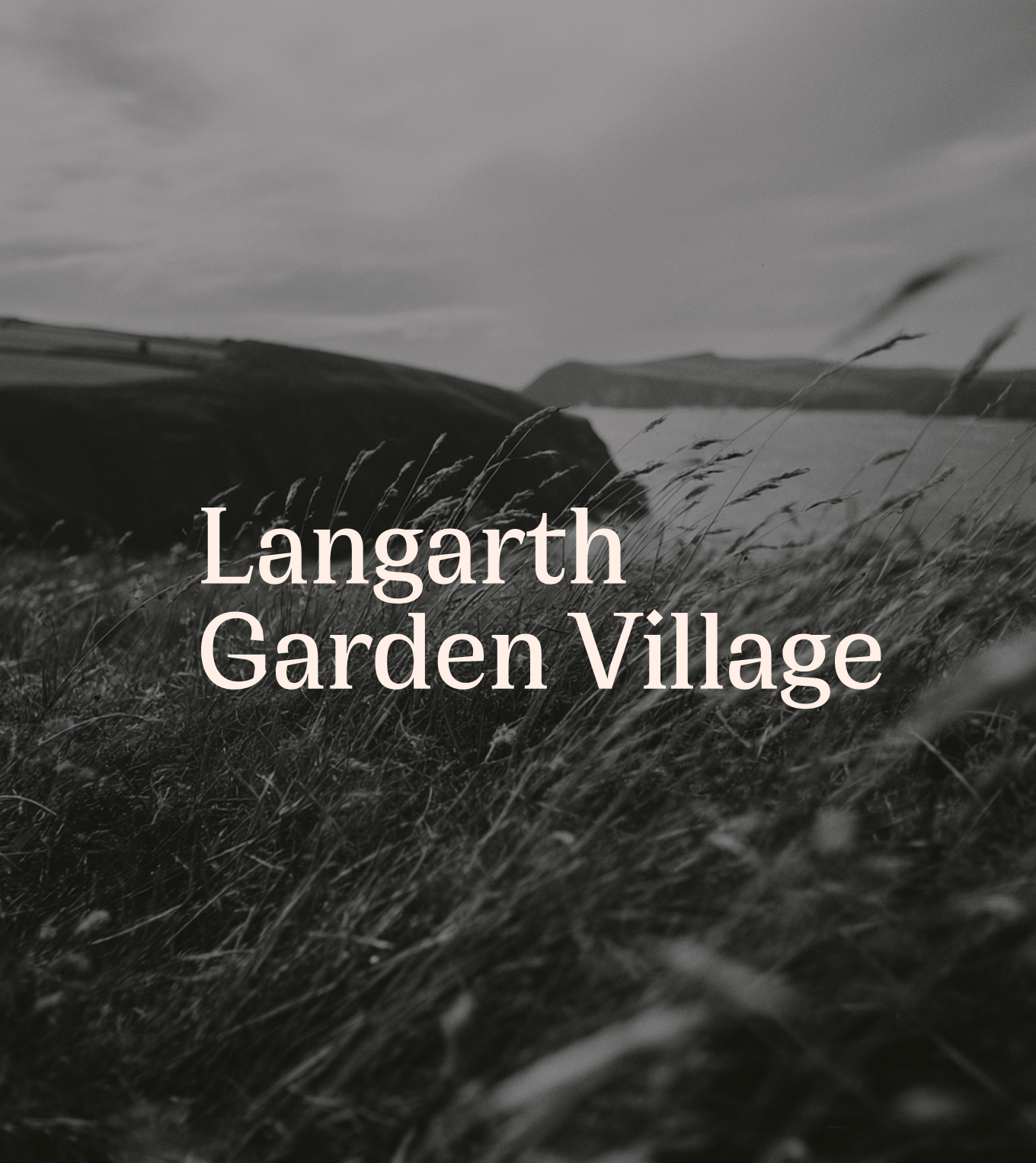 A black-and-white landscape photograph of grassy terrain with hills in the background, overlaid with the text 'Llangarth Garden Village'.