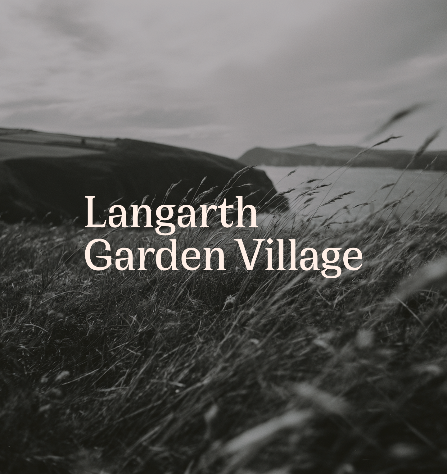 Black and white landscape scene with rolling hills, tall grass in the foreground, and a body of water in the background. Text overlaid reads 'Langanth Garden Village'.