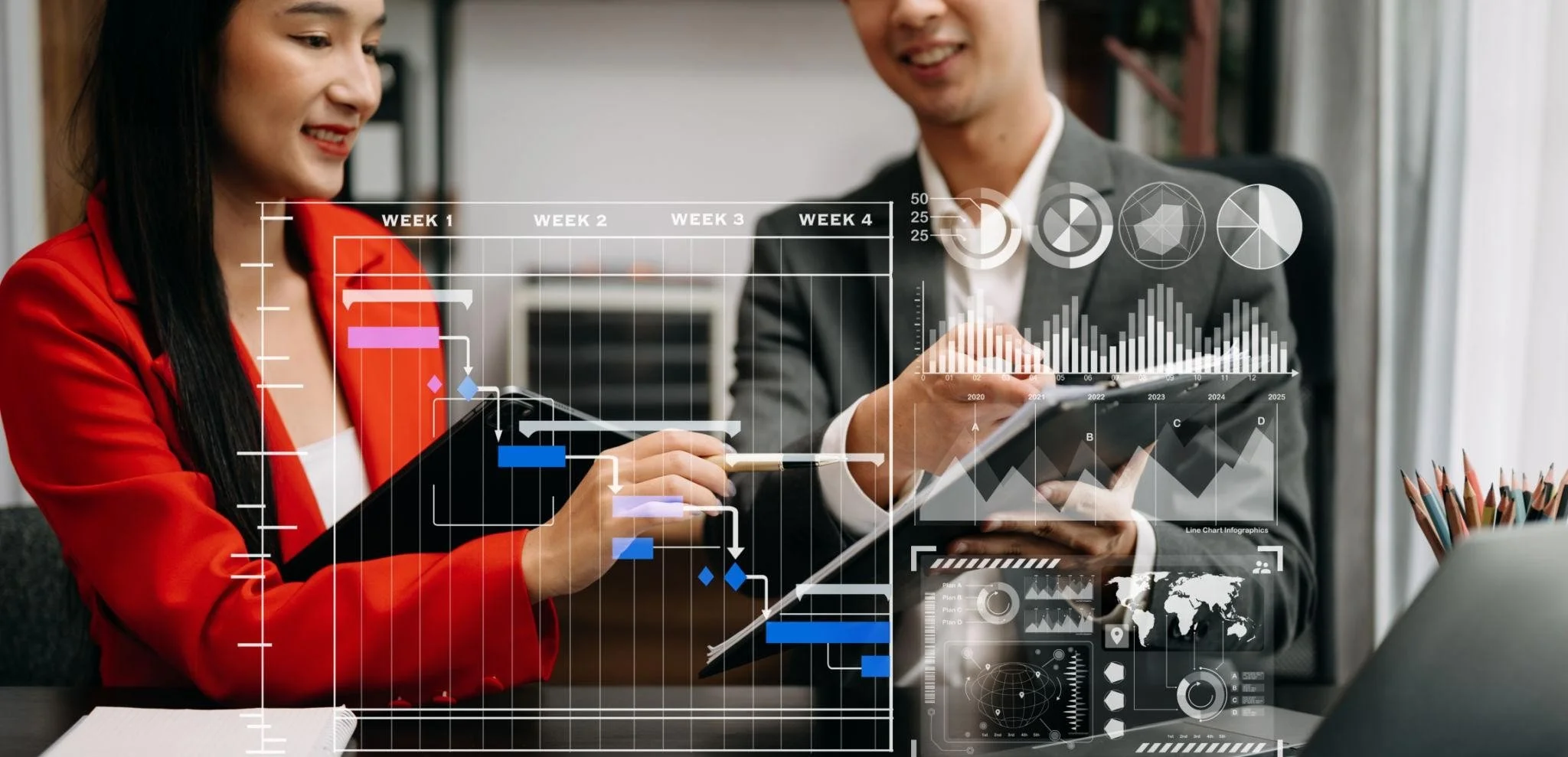 Two business professionals, a woman in a red blazer and a man in a gray suit, are analyzing financial charts and graphs overlaid on the image during a meeting. The woman is holding a tablet and a pen, while the man holds a notebook.