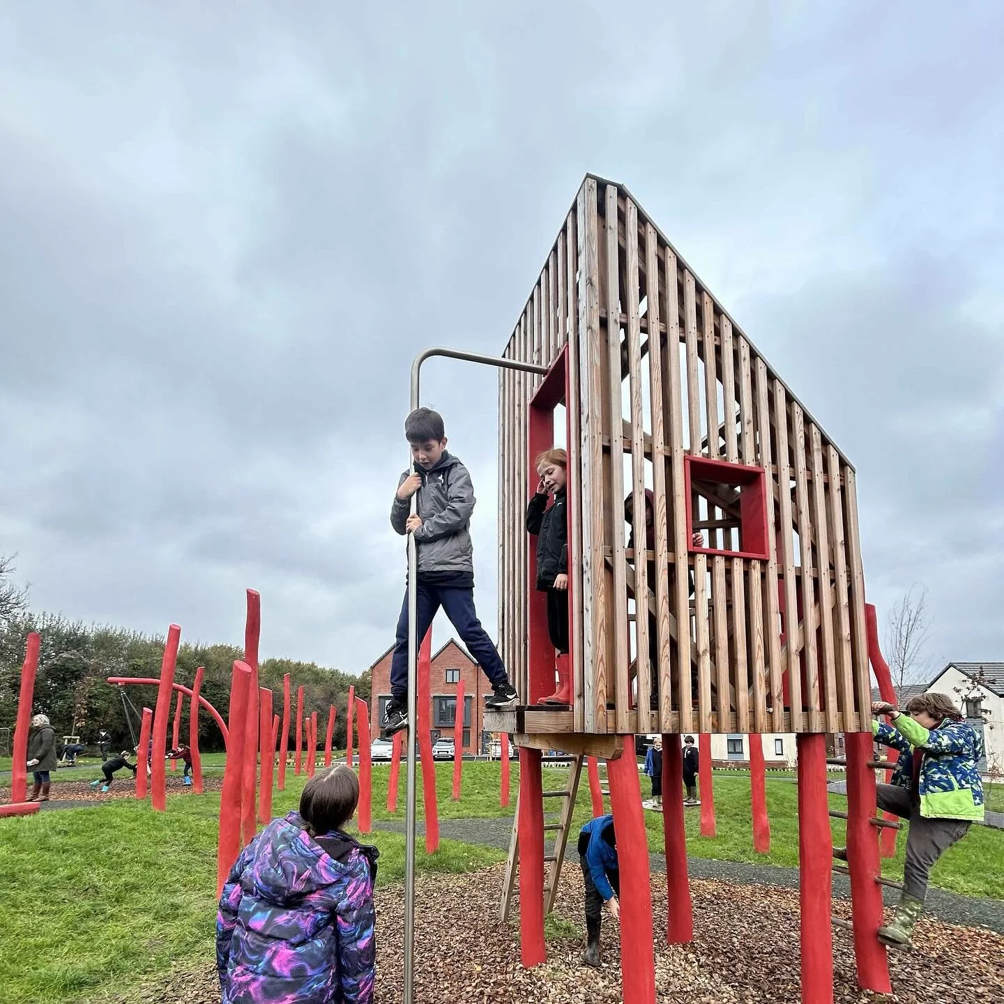 A pop of red to brighten a grey day ❤️ our newly built Enchanted Woodland themed playground in north Cardiff being enjoyed by a local school, who also planted some trees there today🌳 

We brought @amandaspencearchi vision to life, assisting with the