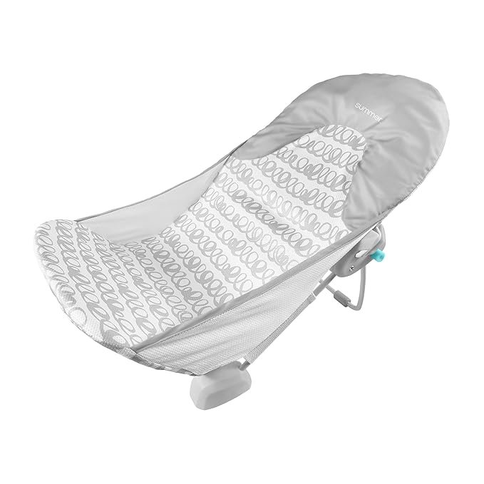 A gray baby rocker with a patterned cushion and mesh sides.