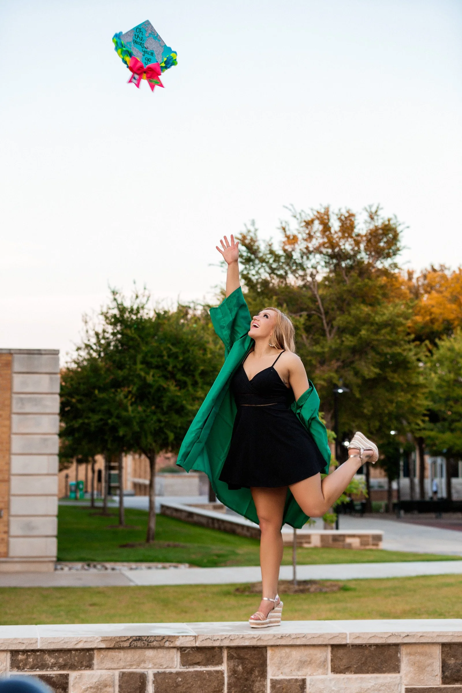 North Texas University Senior portrait with varsity-inspired styling.