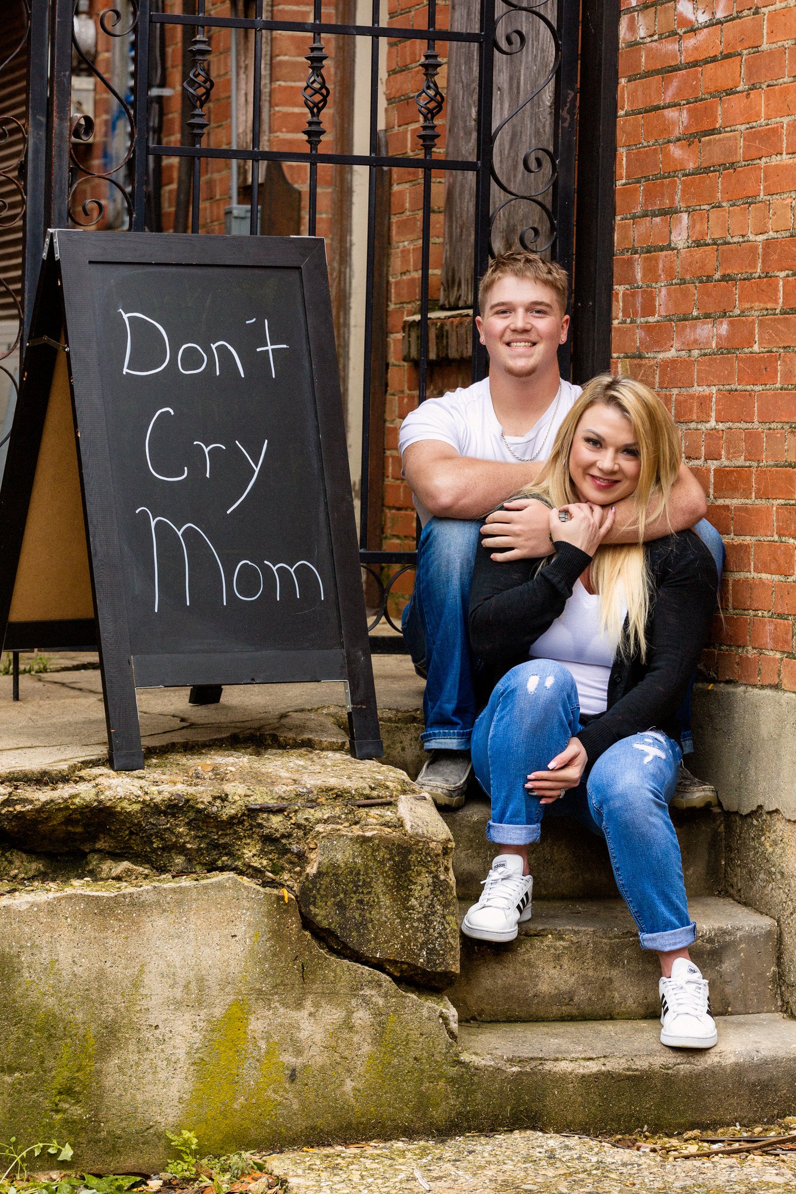 Urban senior portrait showcasing bold style and natural confidence.
