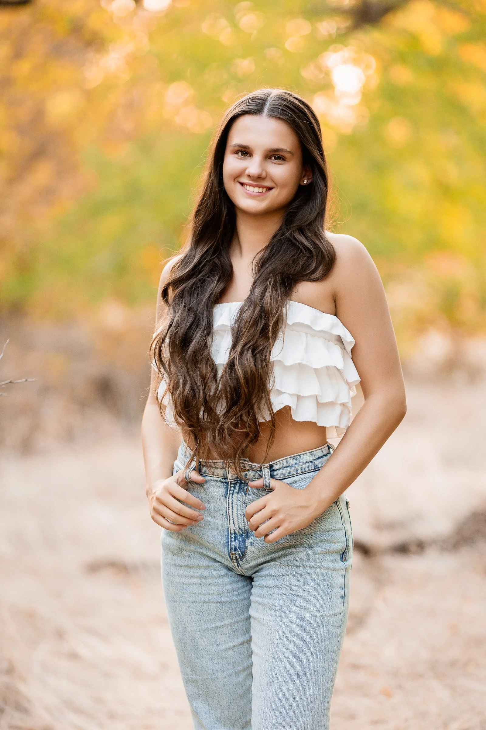 Natural lifestyle senior portrait with effortless confidence.