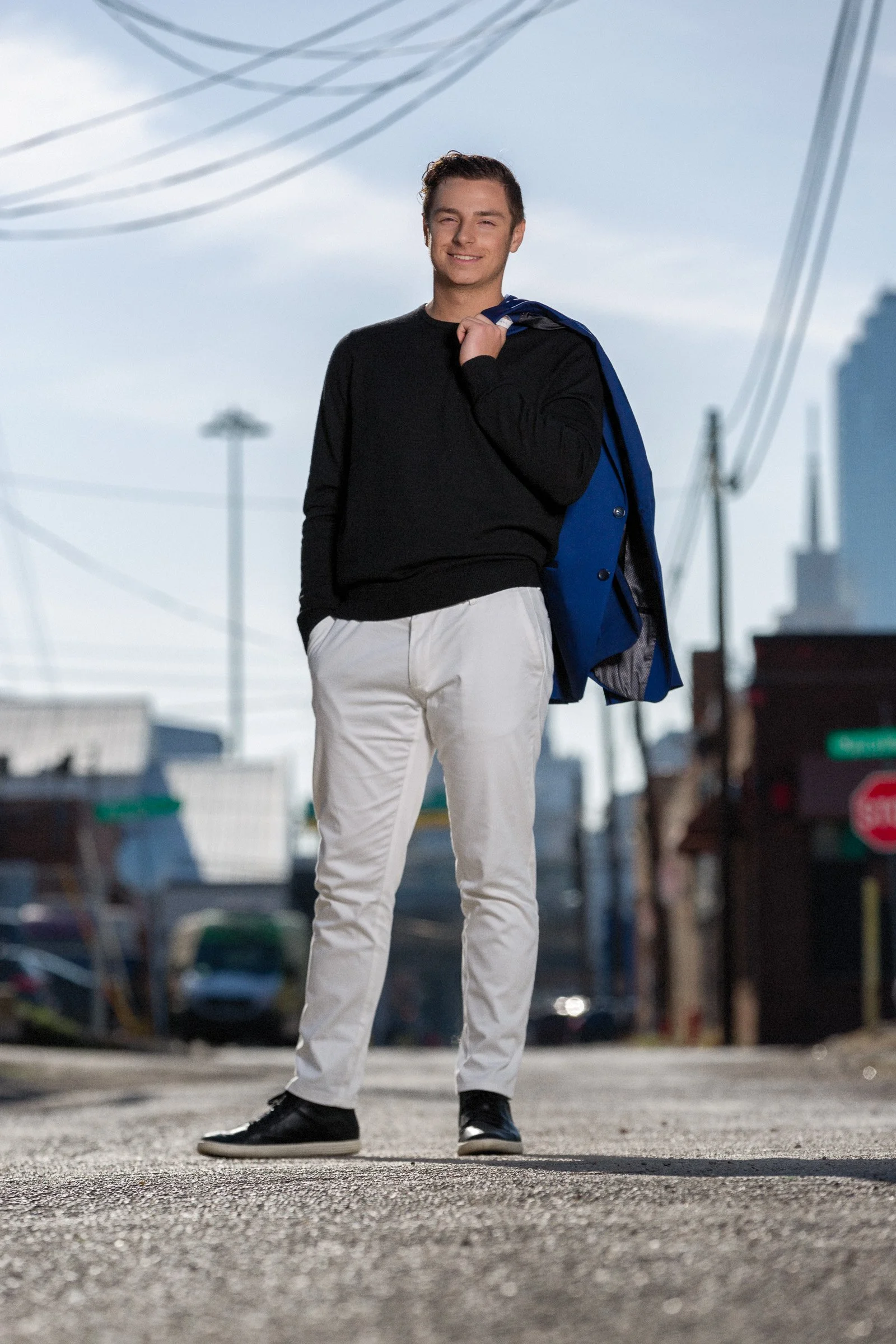 Senior celebration portrait capturing energy and movement.