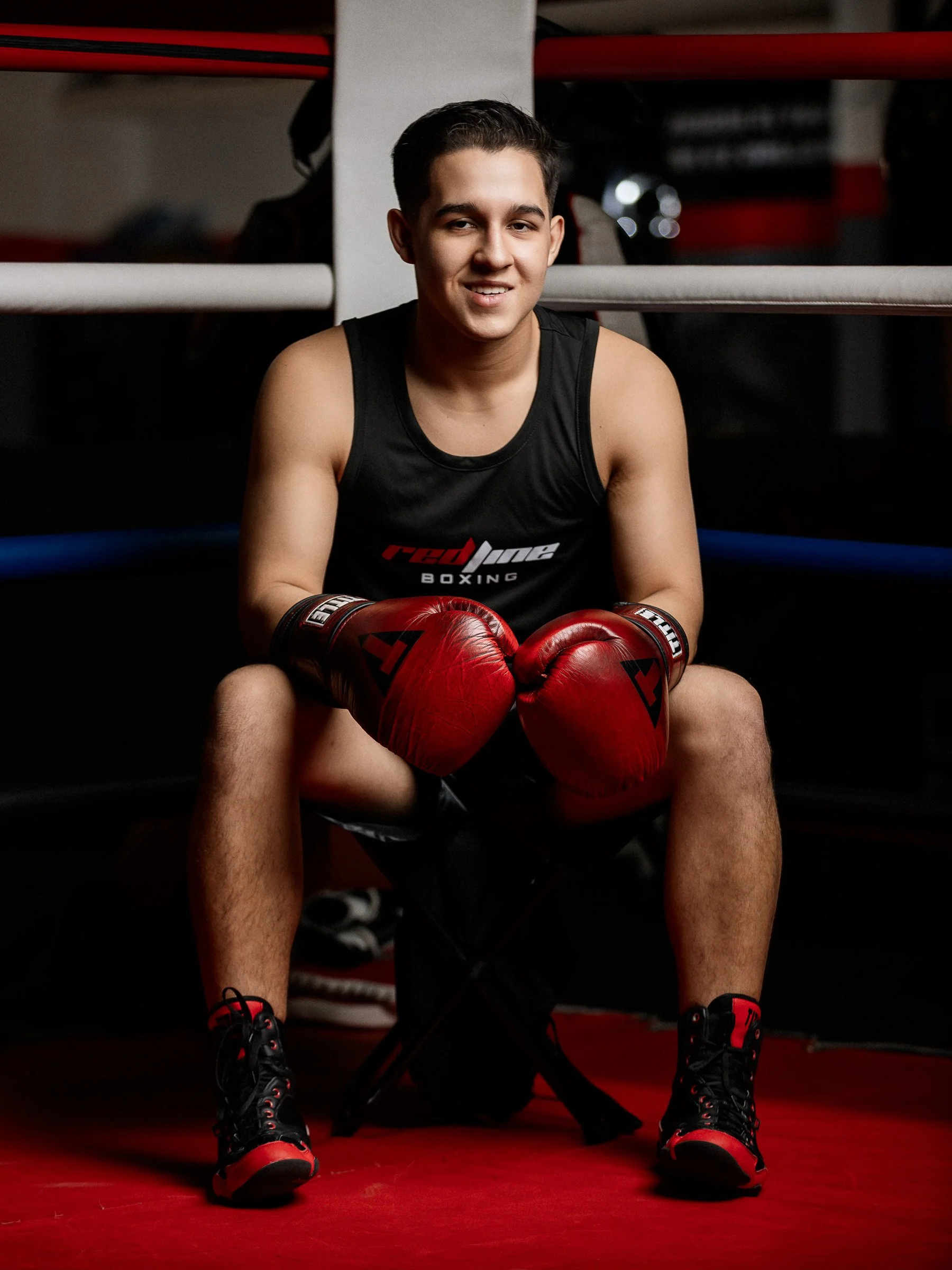 Senior portrait highlighting pride and clean styling.