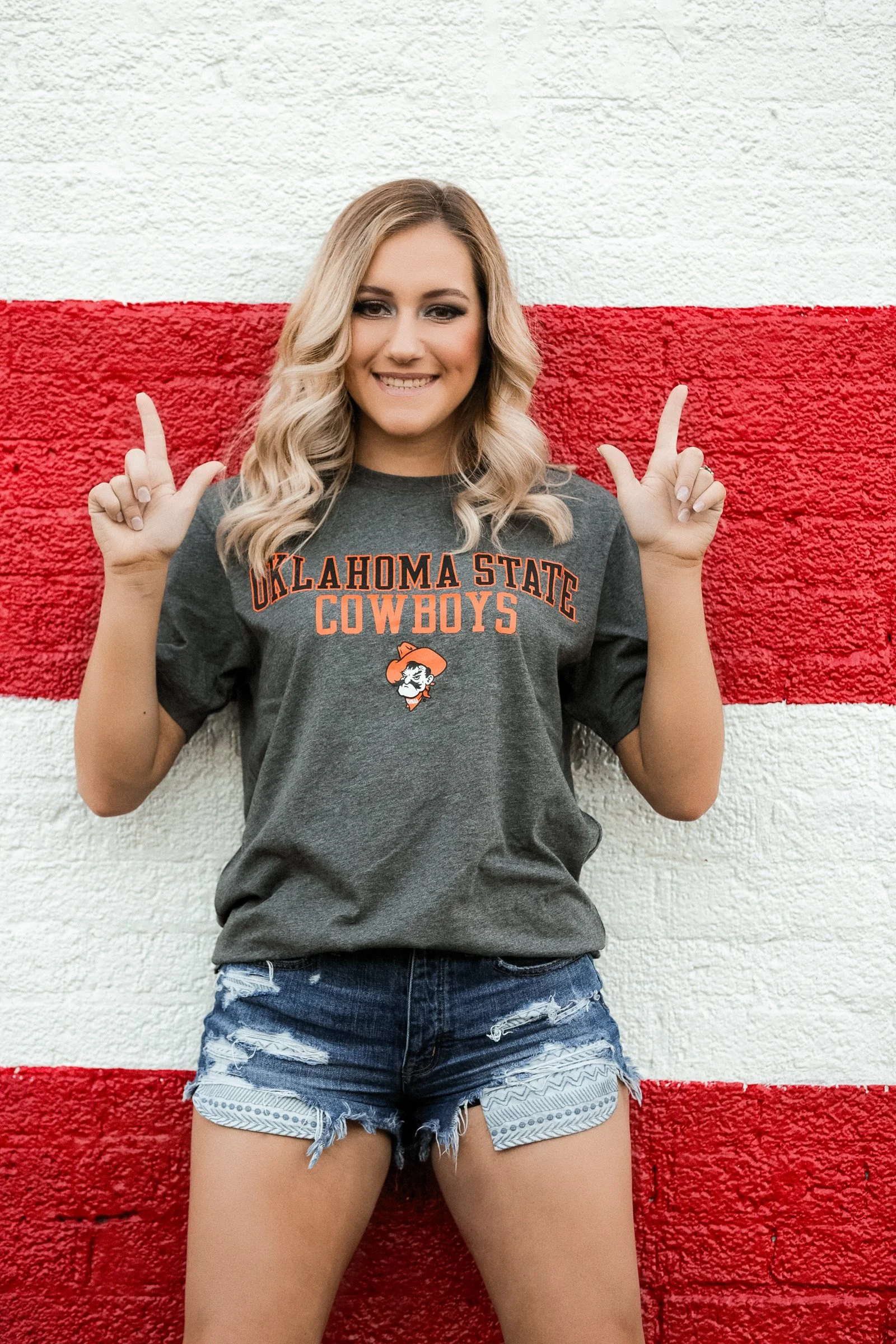 Male senior athlete portrait with bold gym environment.