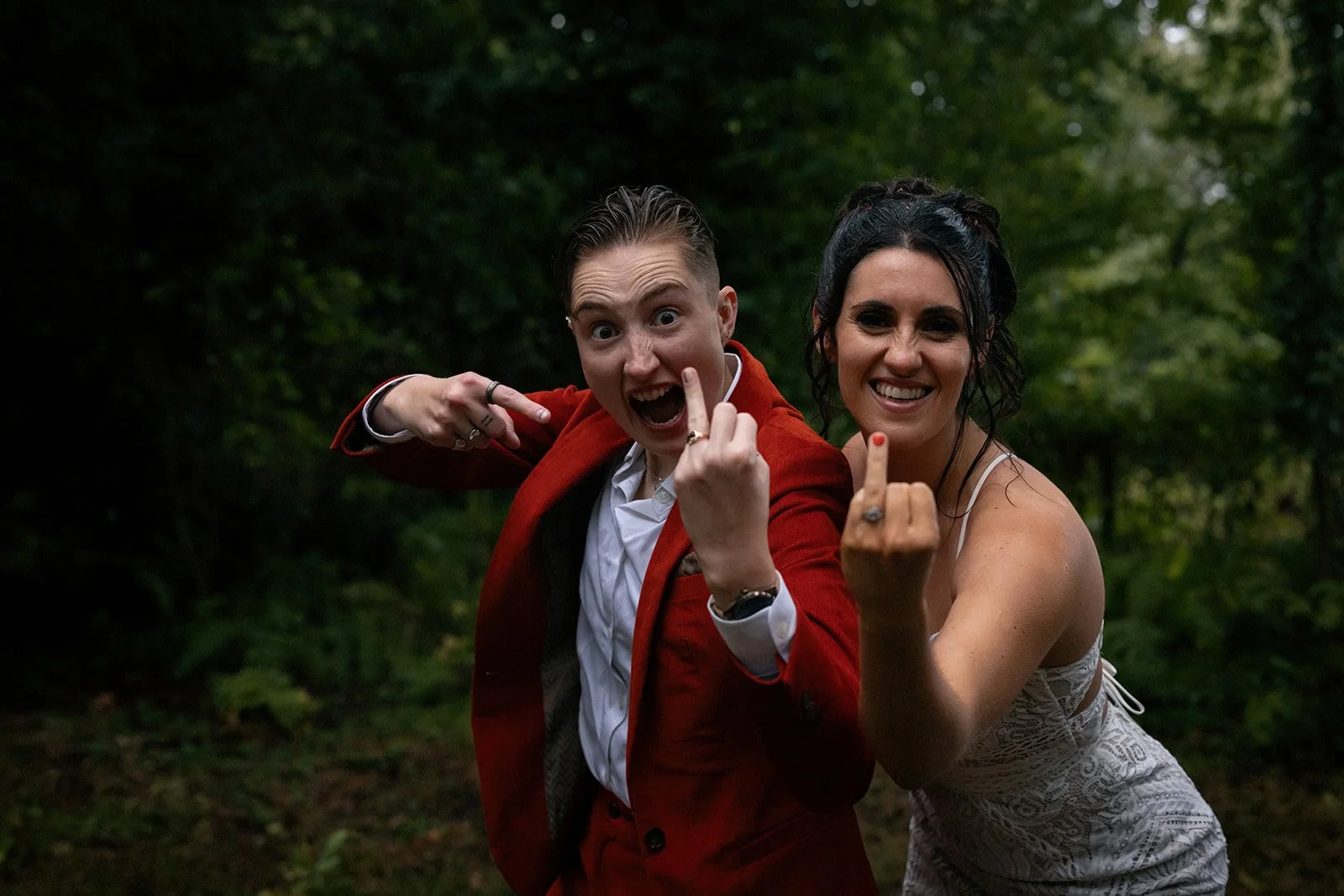 Couple showing ring finger wedding photo