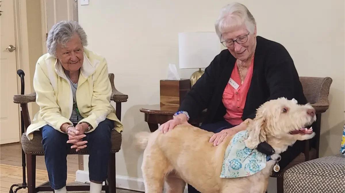 Pet therapy visits are a big part of the activities at Broad Creek Manor Assisted Living.