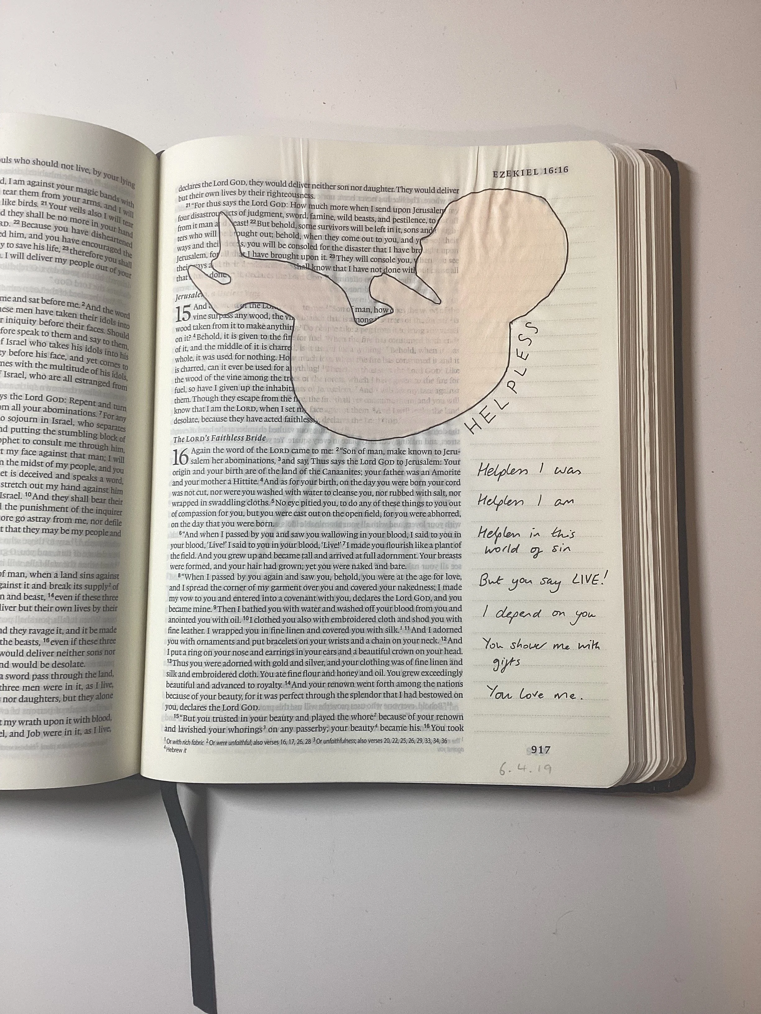 A bible journal page of Ezekiel 16, with the form of a foetus painted on the top half of the page, with the word helpless written along the back of the foetus.