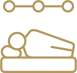 Icon of a person lying in a bed with a pillow underneath their head, and a horizontal line with circles above.