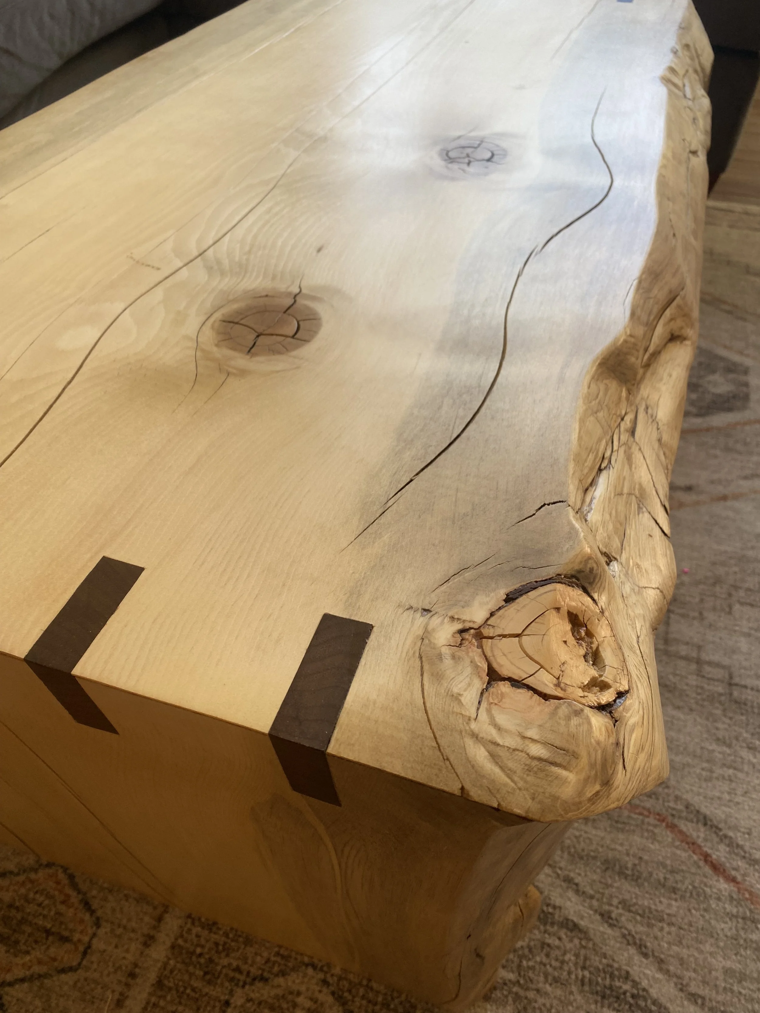 Waterfall Coffee Table made with Douglass Fir and Walnut spine joinery.