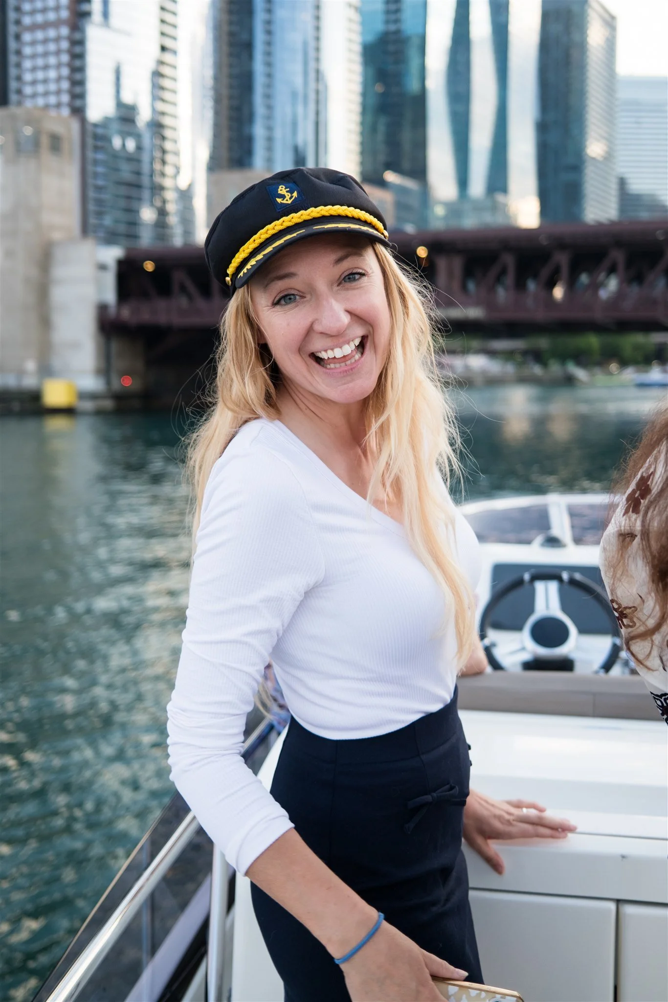 lady on a private yacht rental going down the chicago river