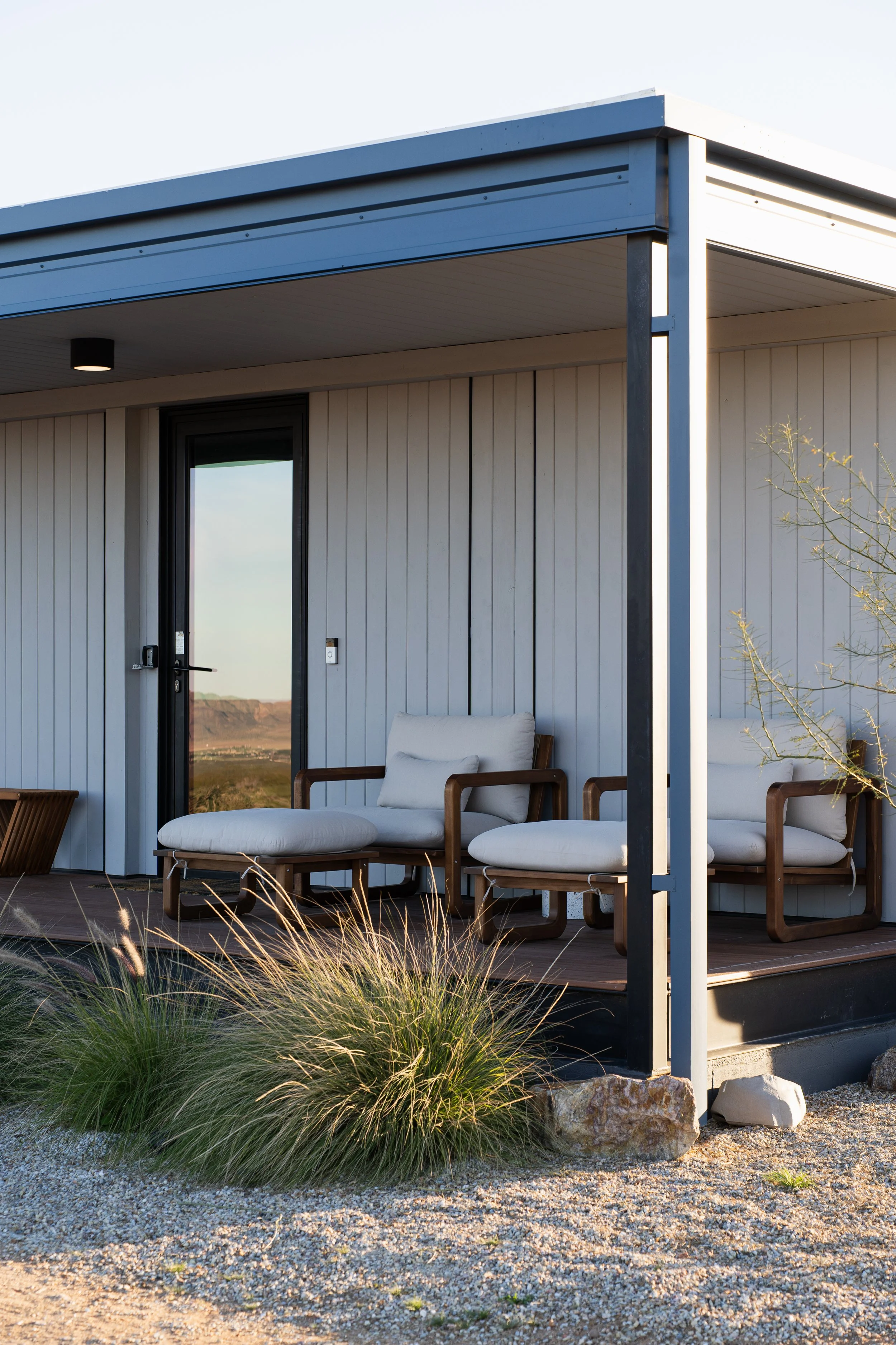 Large, comfortable seating and a footstool on the deck make it the perfect spot to sip coffee and watch the sunrise over the mountains.