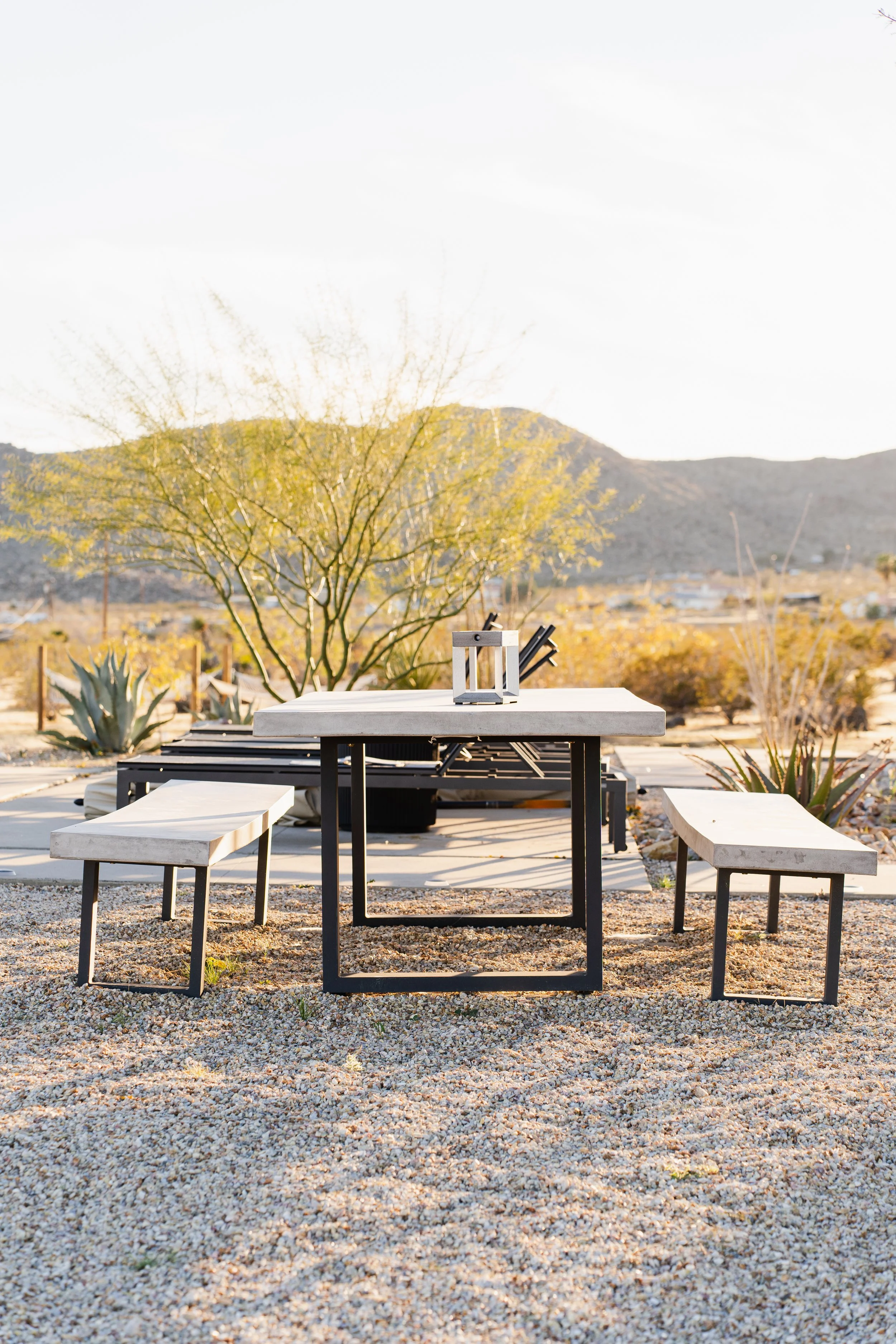 Large concrete dining table with perfect views.