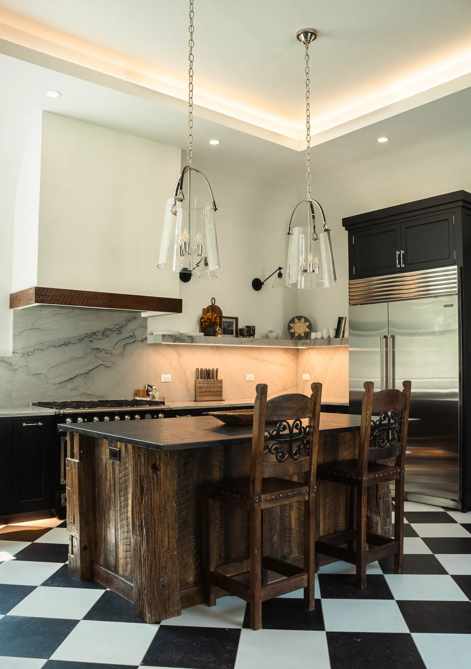 Layered Kitchen Remodel in Wayne, Illinois featuring diagonally placed checkered tile, an Amish-built island and ambient lighting.