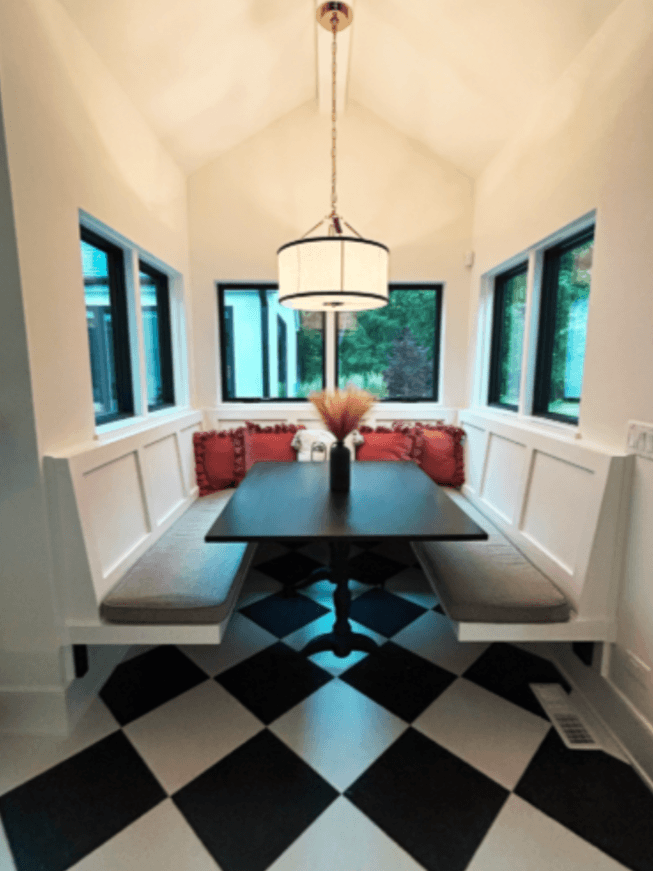 Cozy breakfast nook designed by ROHO Living Interior Design Company in Wayne, Illinois featuring diagonally placed checkered tile.